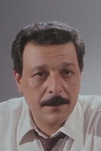 Raafat Raji as The prosecutor in Help Us