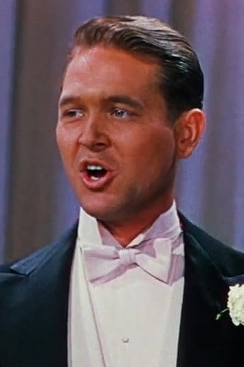 Richard Beavers as Singer in Easter Parade