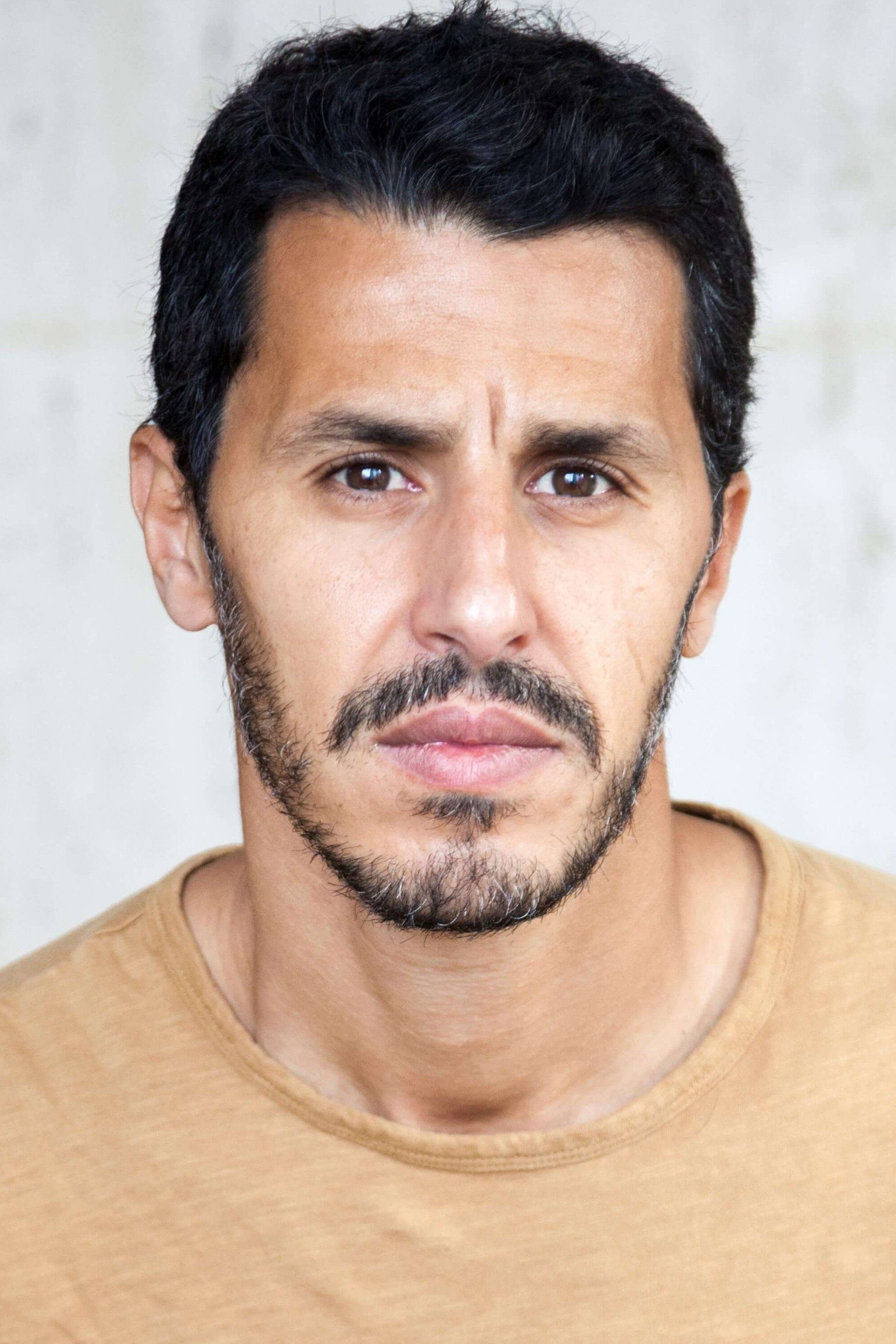 Mounir Margoum as Qusay Hussein in House of Saddam