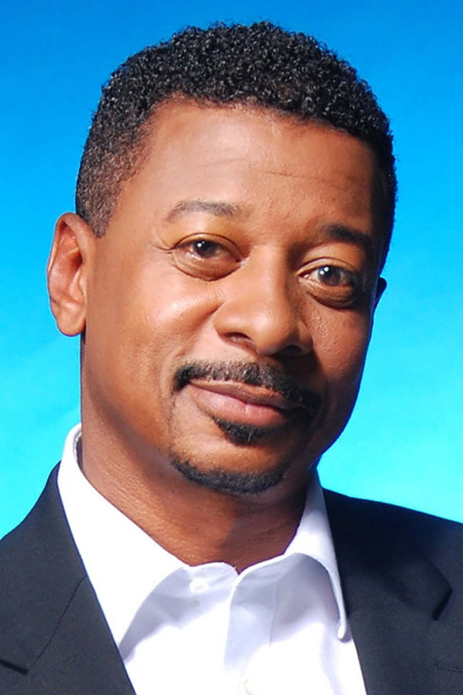 Robert Townsend as Coach Banks in Playin' for Love