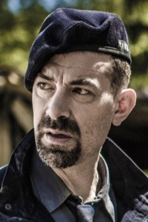Paolo Guglielmoni as Loris J. Bernasconi in Frontaliers Disaster