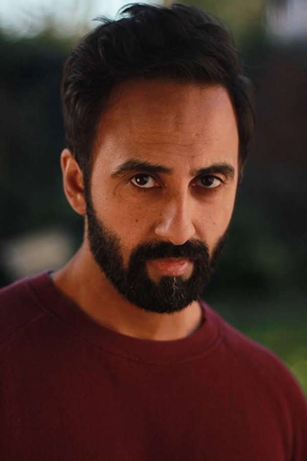 Arjun Singh Panam as Baba in There Will Come Soft Rains