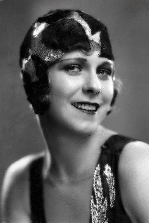 Betty Francisco as Sylvia Baldwin in Gambling Wives