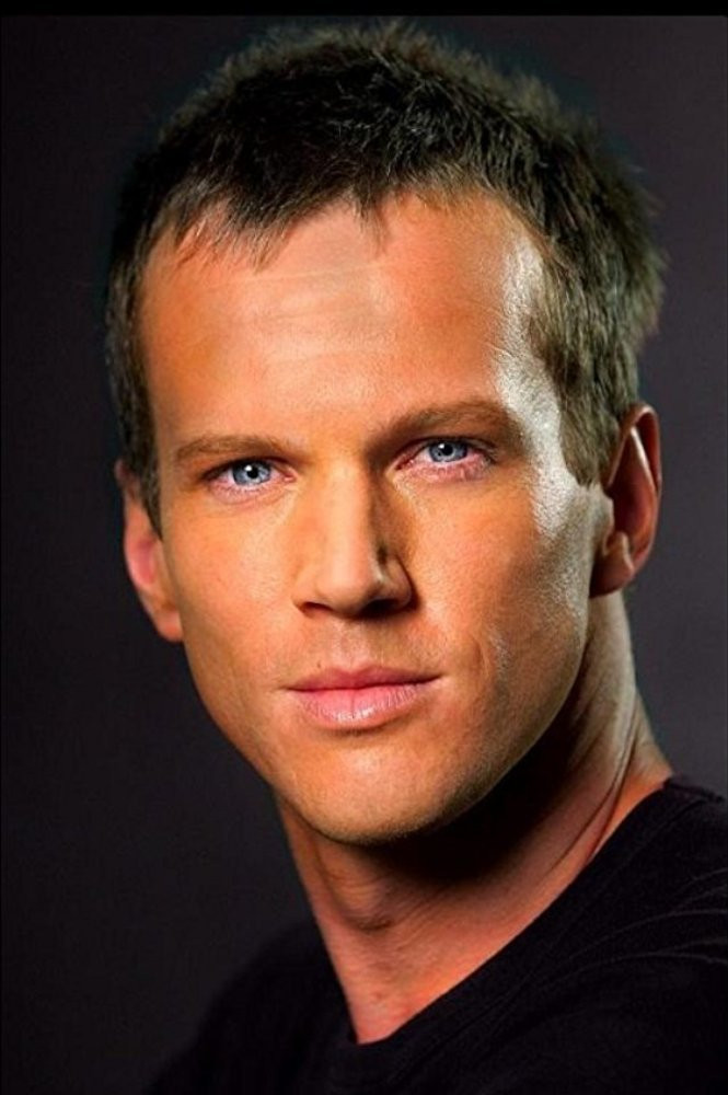 Jack Ellis as Mr. X in The Debt Collector