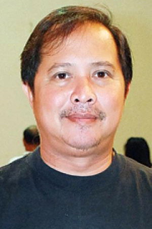 Puttipong Promsaka Na Sakolnakorn as Mek in Mae Nak Phra Khanong