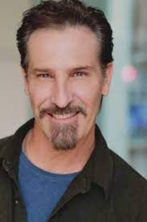 Mark Vasconcellos as Garrett in The Prototype