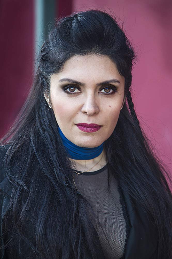 Sahba Keihani as Rex Club in Muna