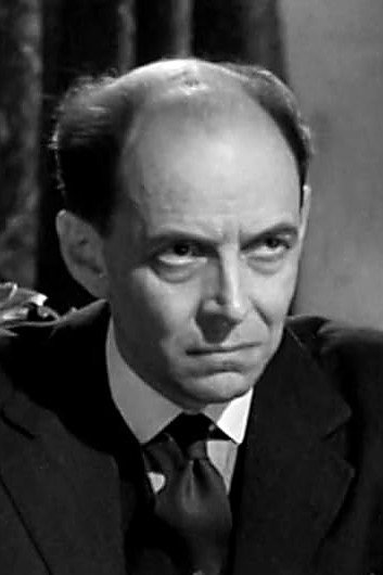 John Ruddock as Martin Kraus in Question 7