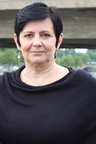 Sanna-Kaisa Palo as Helena Salakari in Seitsemän