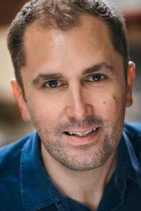 Nathan Head as Raymond Korkinsky in Mark Macready and the Archangel Murders
