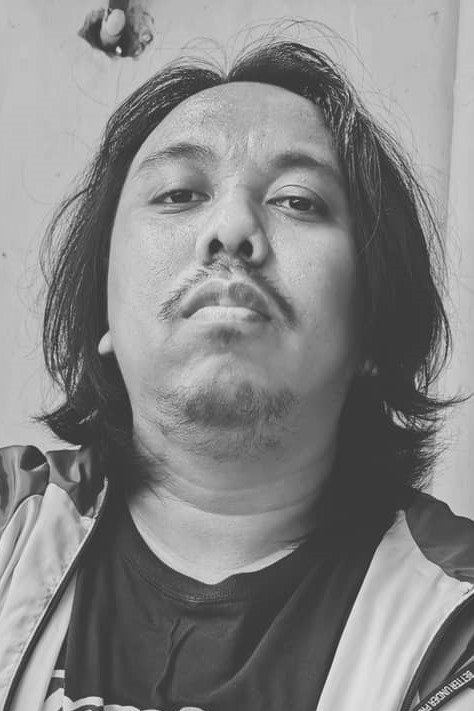 Benidictus Siregar as Cokro in Lara Ati