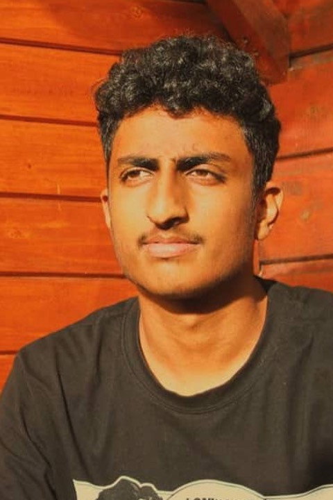 Radjiv Nourbir as Le trompettiste in Besoin d'air?