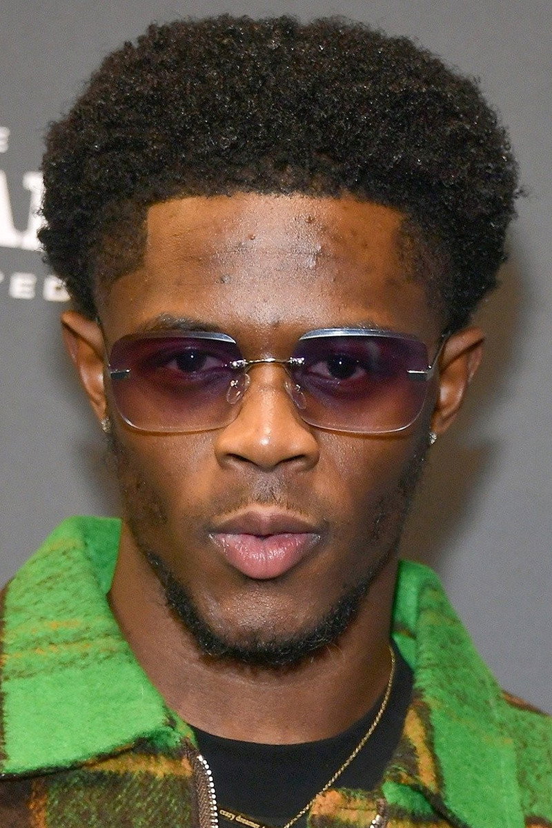 Josiah Cross as Reggie Robinson in Lady in the Lake