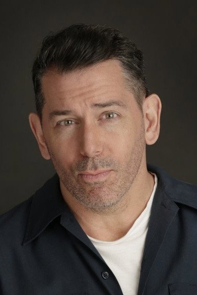 Rich Lounello as Captain Massney in Assault on Hill 400