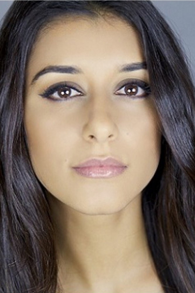 Sandy Sidhu as Janet Dunleavy in Frozen in Love