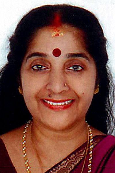 Geetha Nair as Padmini's mother in Sarkar Colony