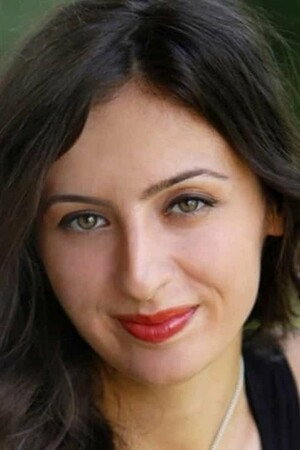 Merve Bulut as Emine in A Small September Affair