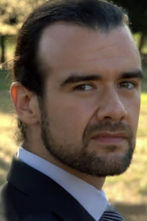 Tiziano Ferracci as Achille de Ostia in Gatti & Sfigatti