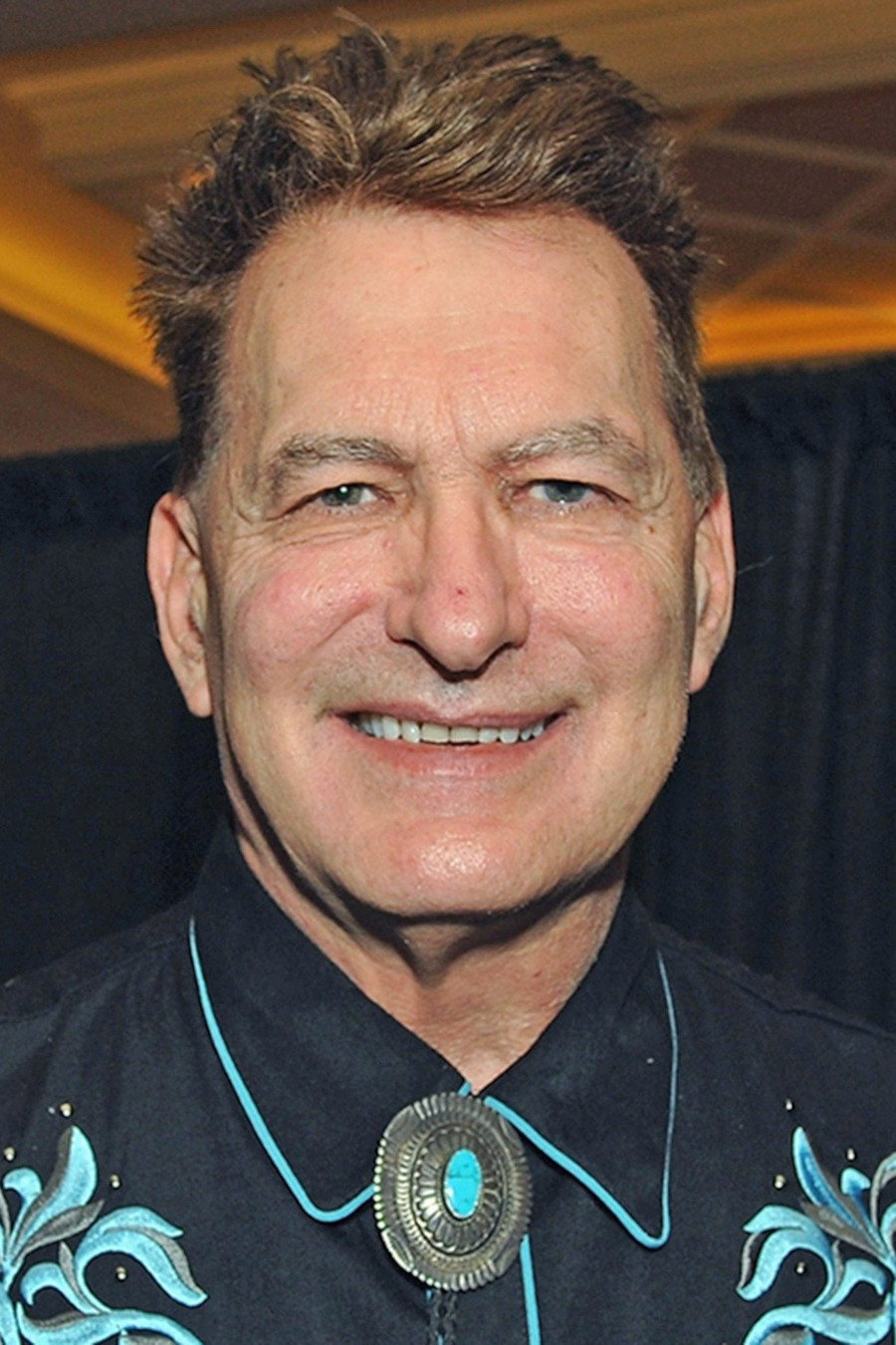 John Bloom as Joe Bob Briggs in The Last Drive-In: Joe Bob's Halloween Hoedown
