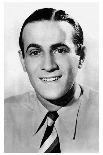 Tino Rossi as Julien Mortal / Paolo in The Unknown Singer