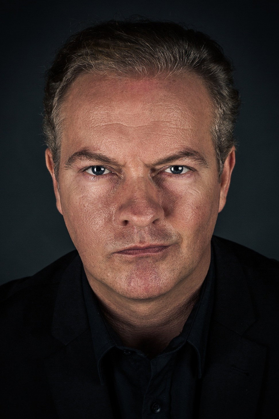 Simon Weir as Sexy Canadian Intelligence in The Leaf Blower