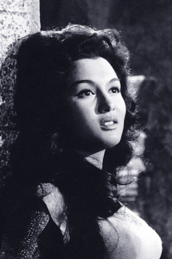 Bella Cortez as Suani in The Seven Revenges
