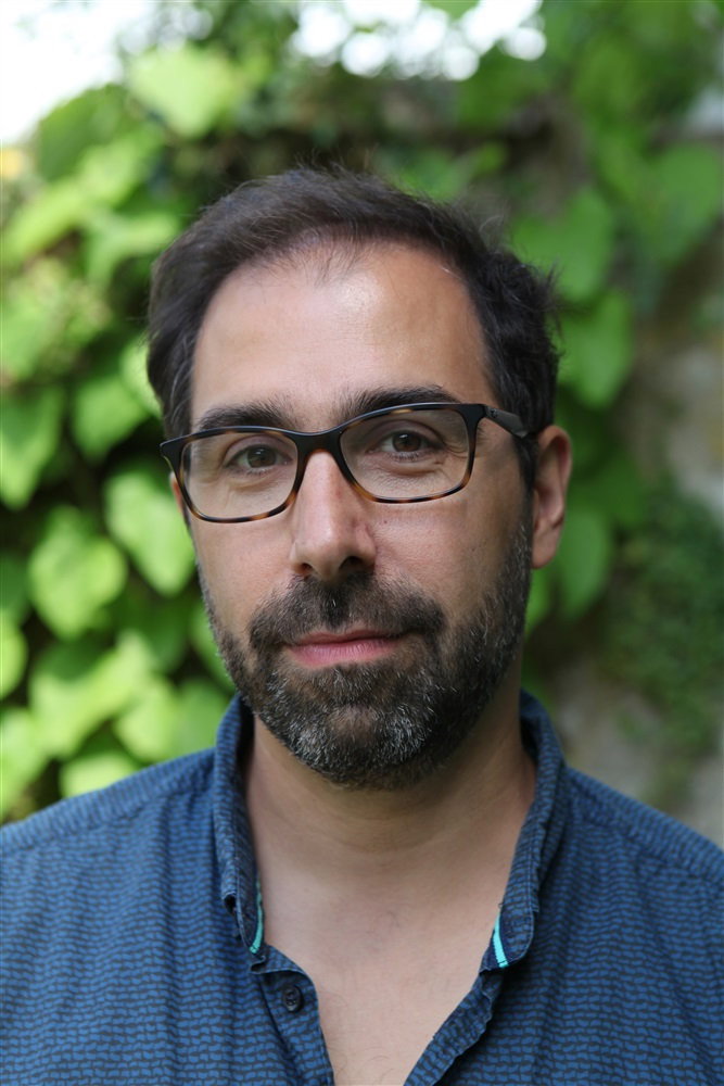 Julien Sibre as Officer (voice) in Eugène