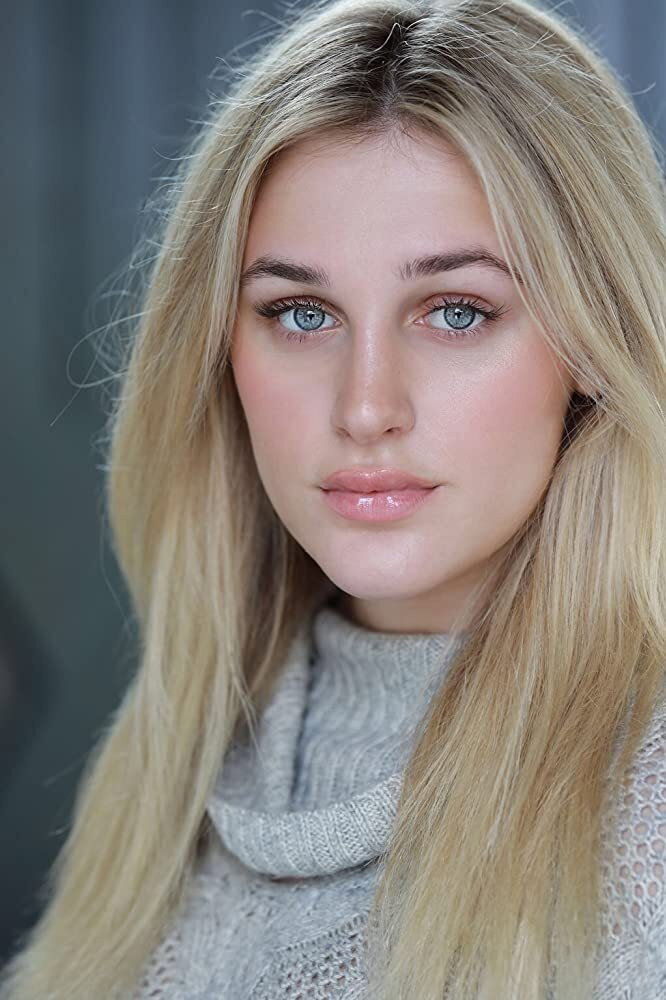 Madi Monroe as Amy Maxwell in Zombie Town