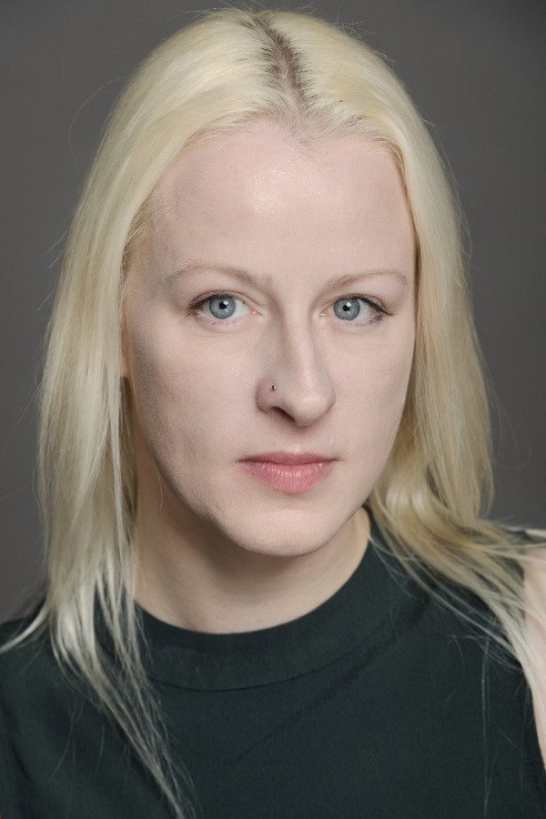 Claire Greasley as Angry Resident in Containment