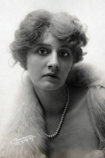 Gertrude McCoy as Olive Clayton in Hidden Fires