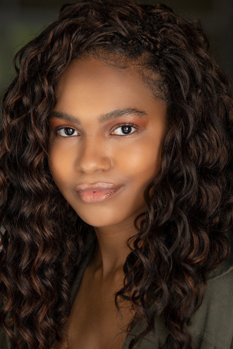 Christina Simone as Tia in Close Enough To Burn