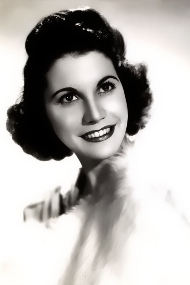 Maxene Andrews as Maxene Andrews in In the Navy