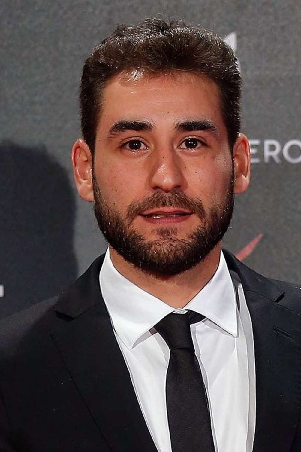 Jesús Carroza as Padre Manolo in Love & Revolution