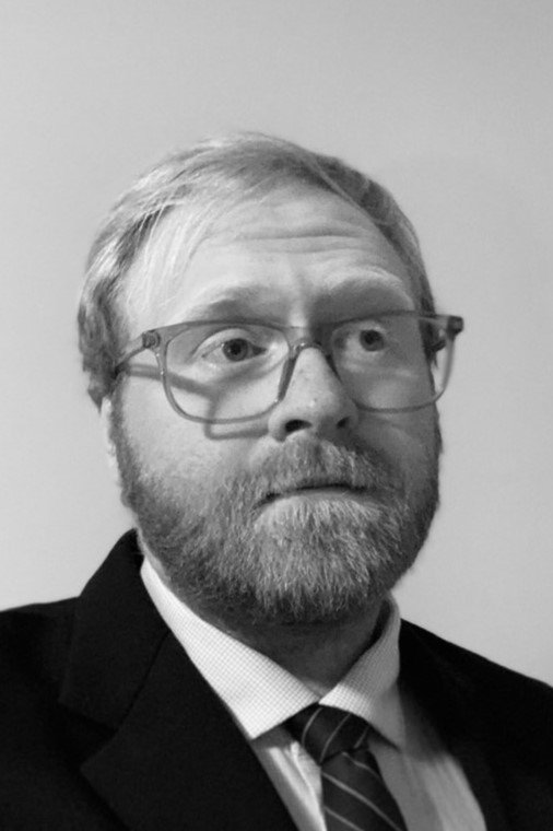 Patrick Karrow as Boss in Overworked