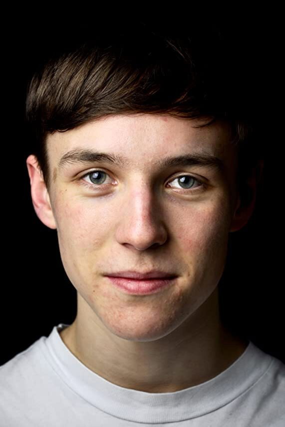 Oscar Kennedy as Young Liam in Ladhood