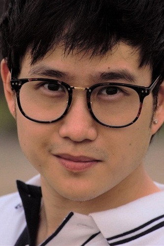 Jason Tham as Elvin in Honeymoon Photographer