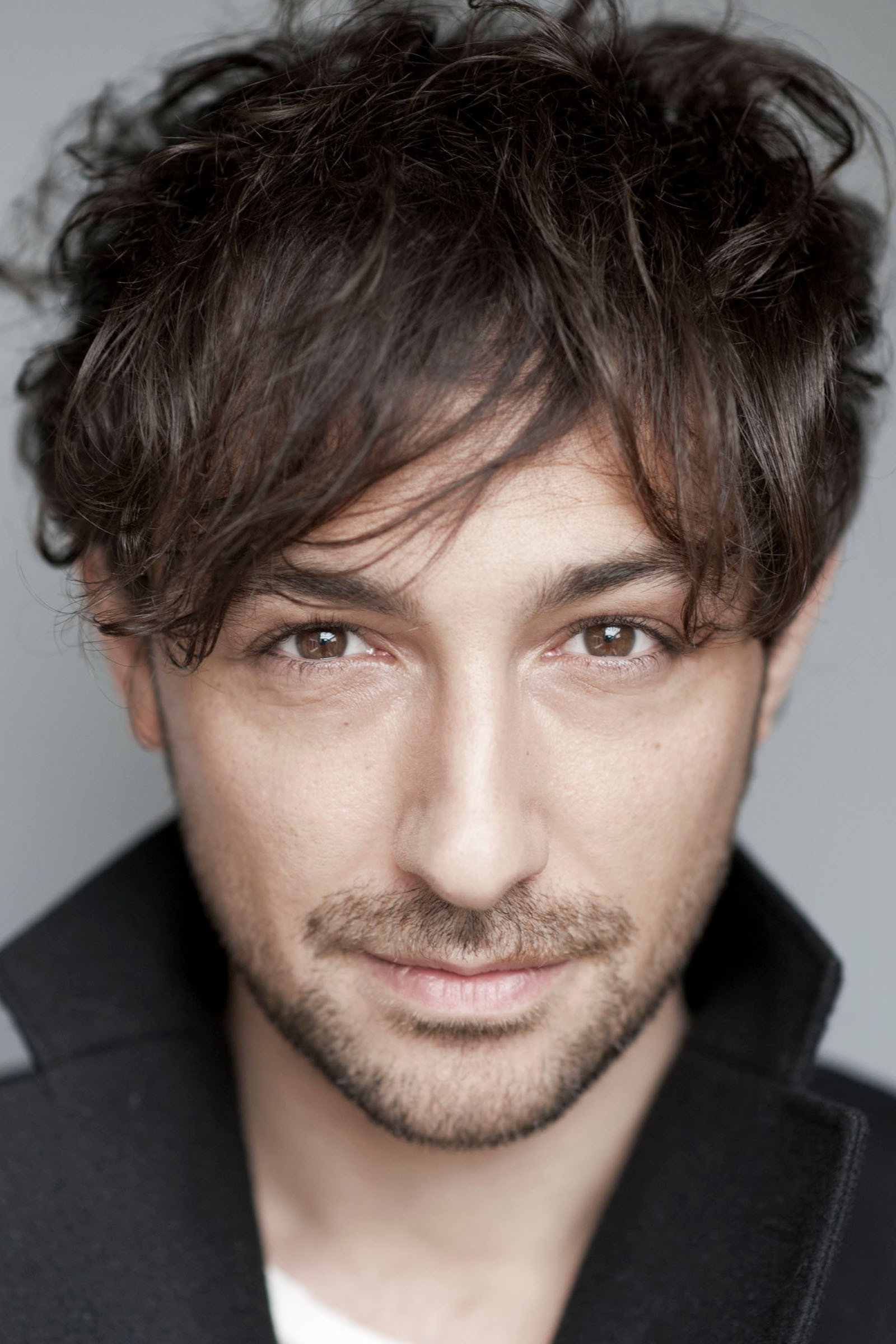 Alex Zane as Zach in Cannibals and Carpet Fitters