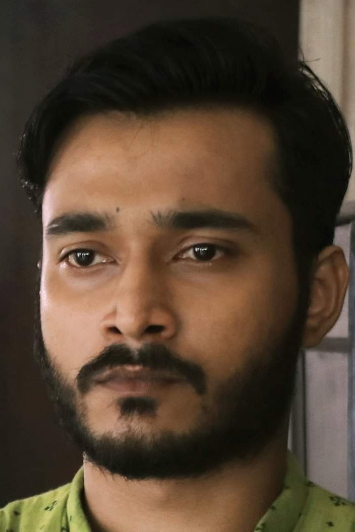Suhotra Mukhopadhyay as Bappaditya "Bapi" Dey in The Eken