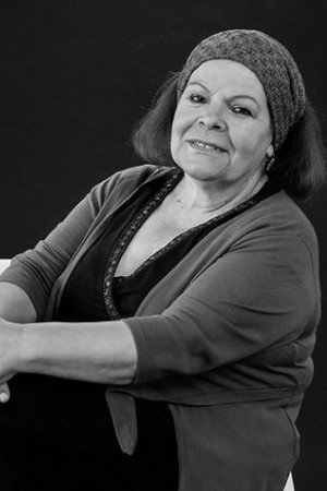 Adelaide Teixeira as Senhora in Voyage to the Beginning of the World