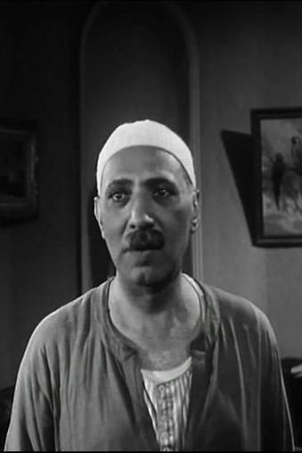Abbas ElDaly as Hajj Zain's friend in Tofahet Adam