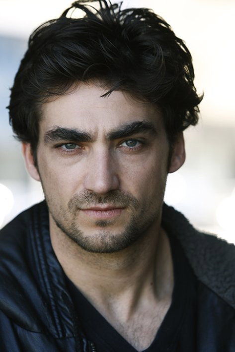 John Kyle Sutton as Roman in Angel Road