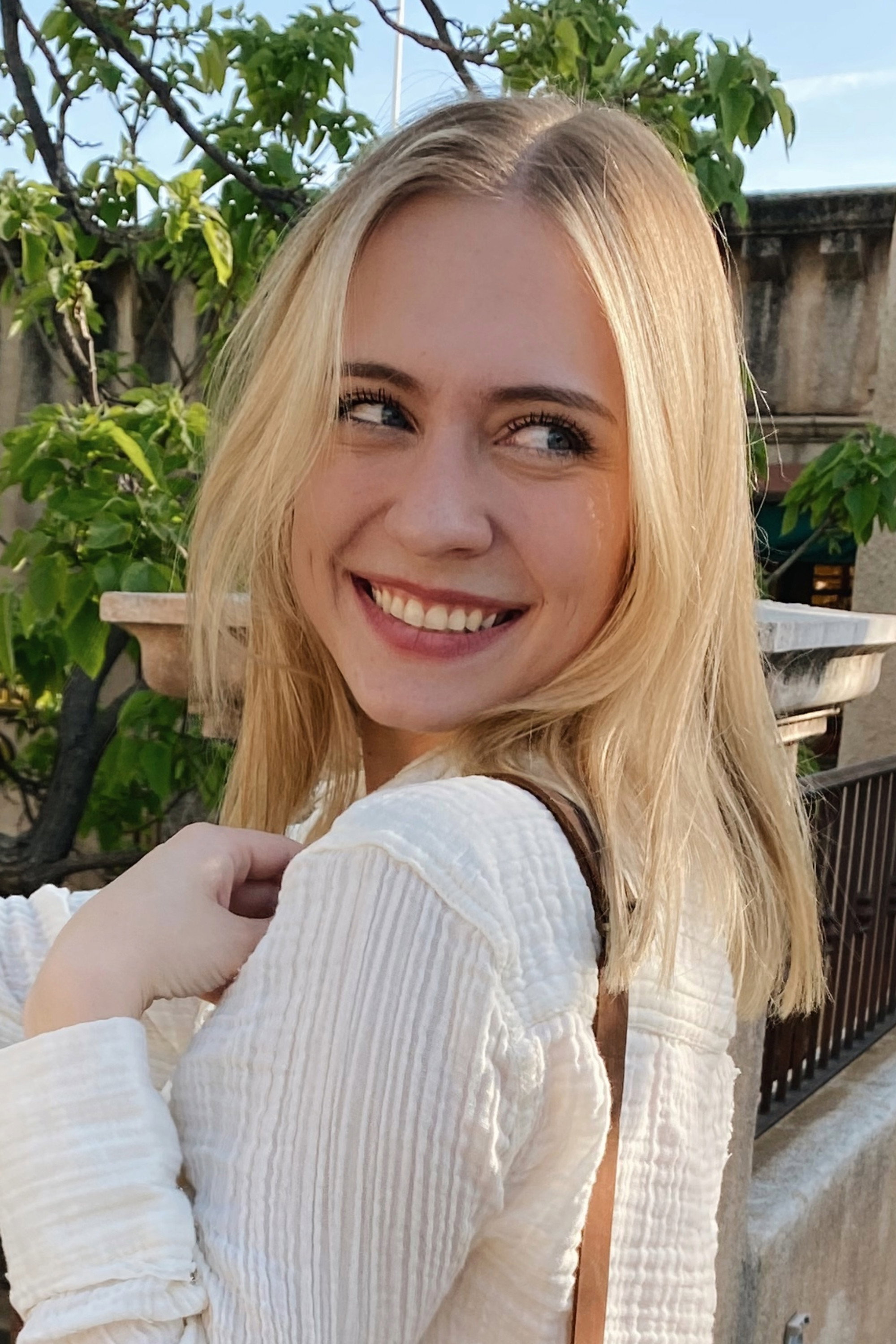 Noell Komar as The Interviewer in What We Do During the Holidays
