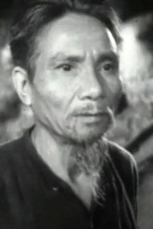 Tiem Ton as Cu Xong in Fire in the Woods