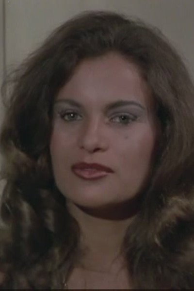 Andrea Camargo as Roseli in A Praia do Pecado