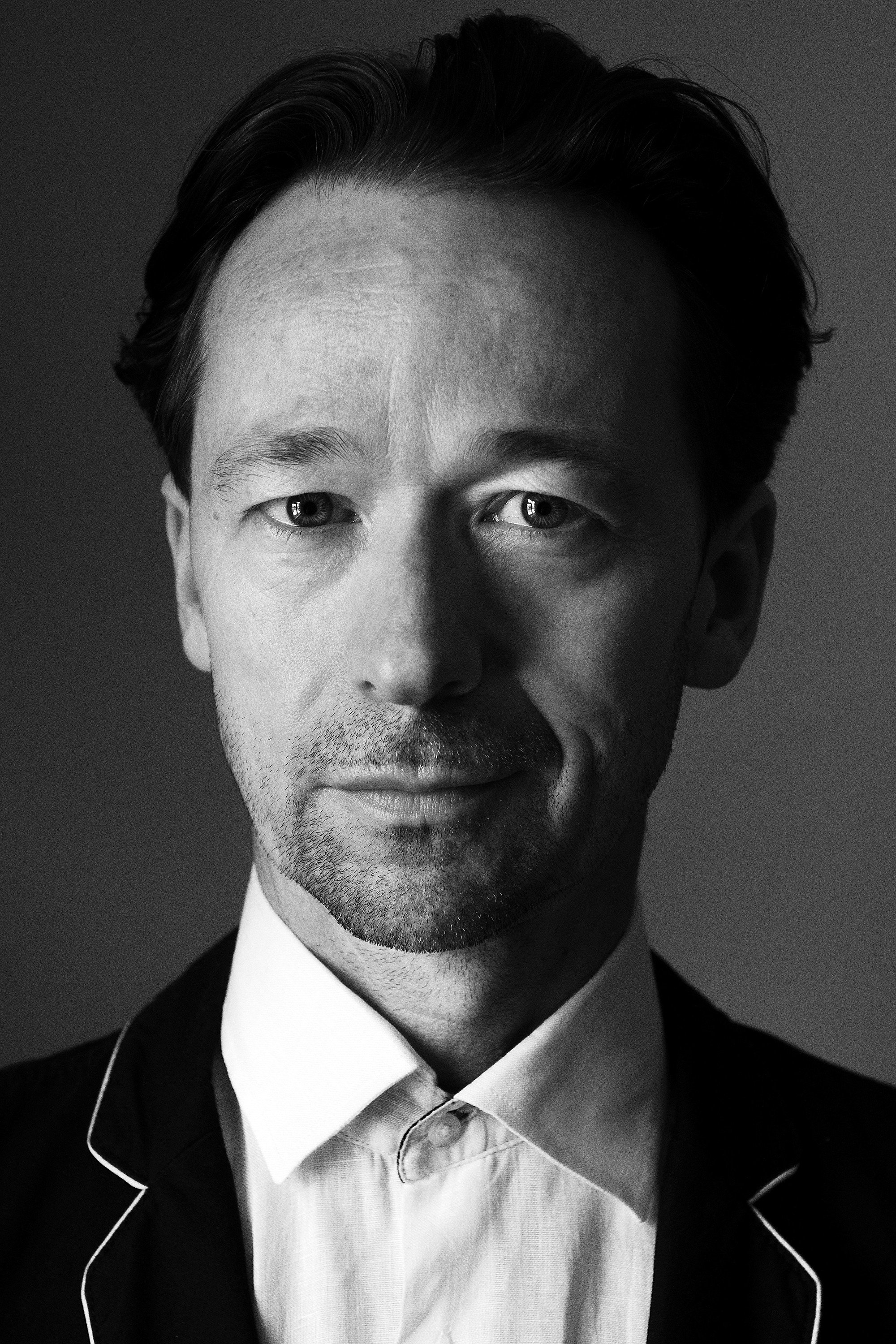 James Flynn as John in The Confidante