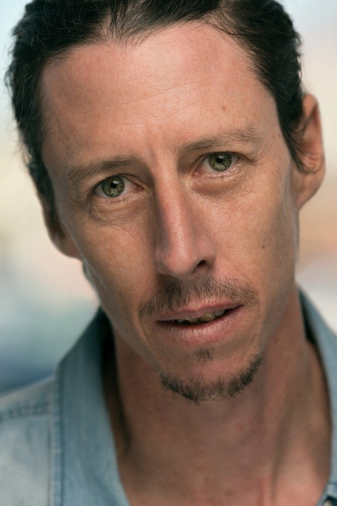 Brendan Bacon as Ben in Innuendo