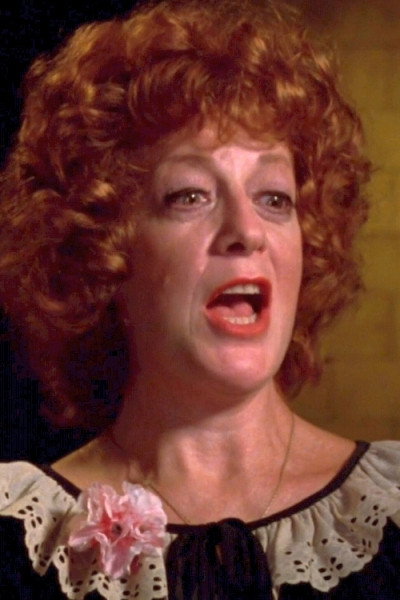 Anita Dangler as Miss Petrus in A Killer Among Us