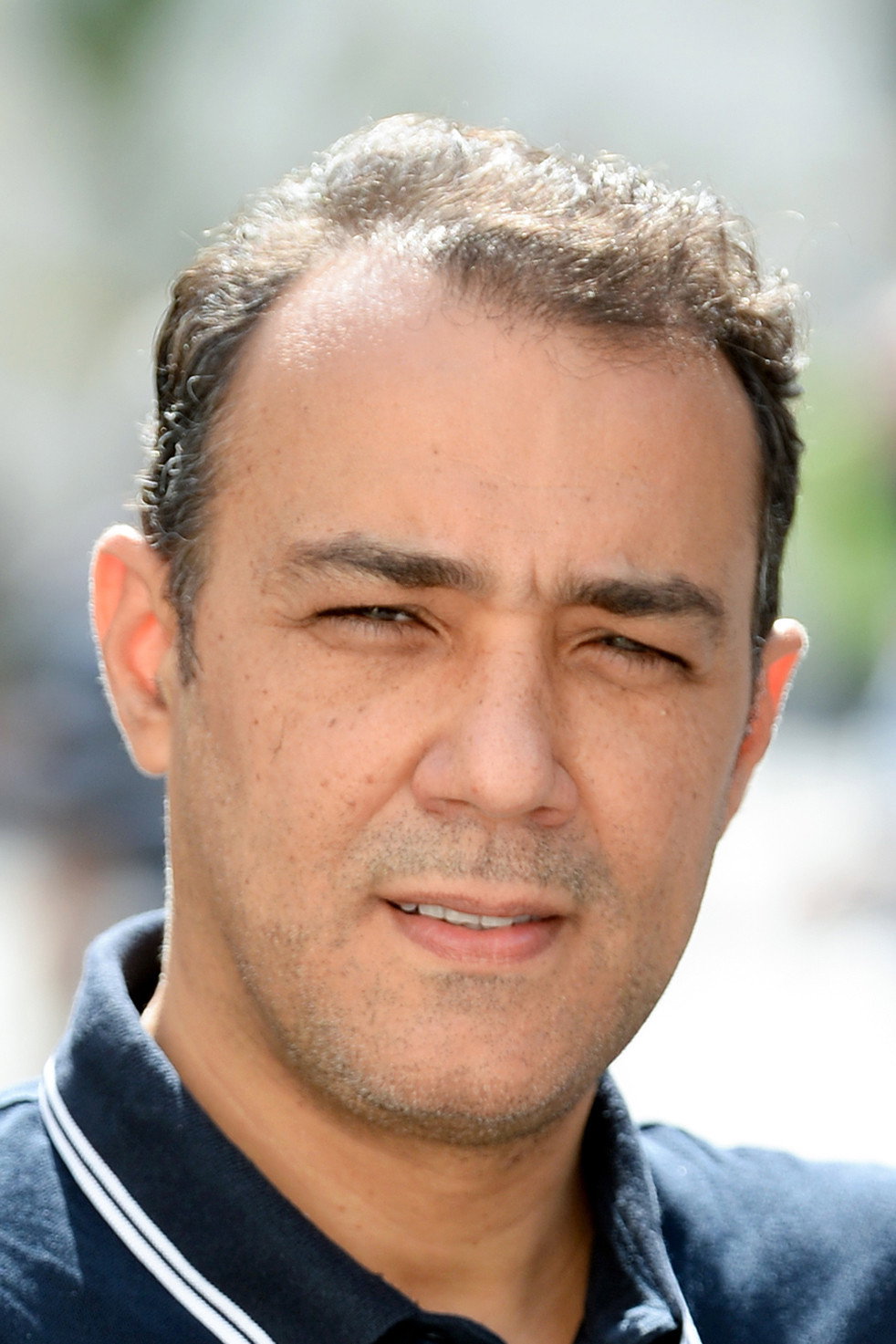 Khaled Houissa as Officer Edko in Sharaf