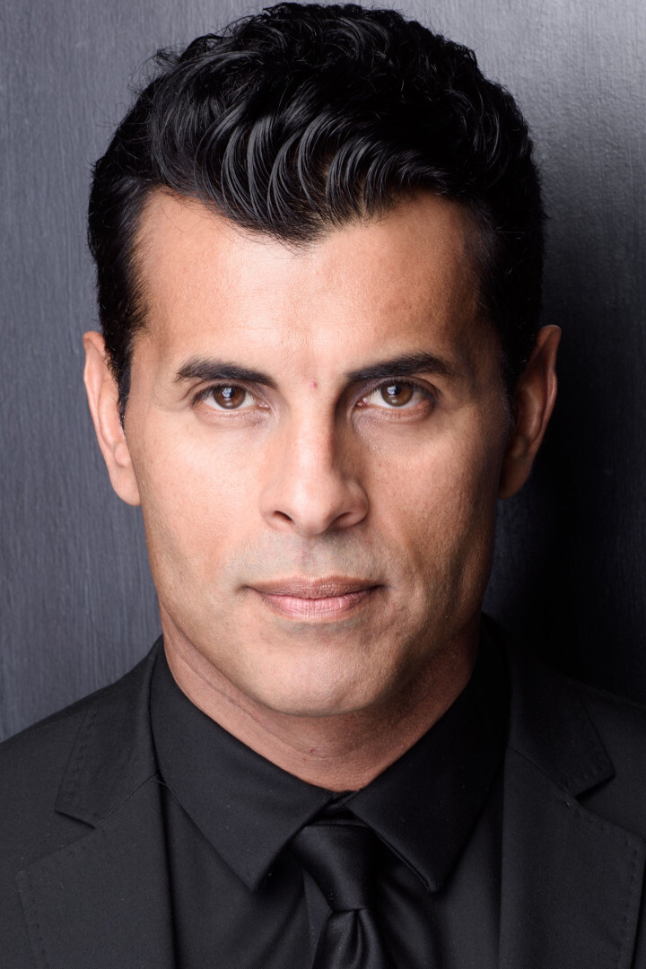 Ricardo Molina as Officer Burgess in In This Gray Place