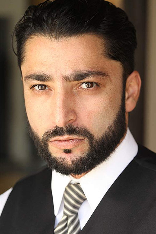 Ali Olomi as Omar in Day One